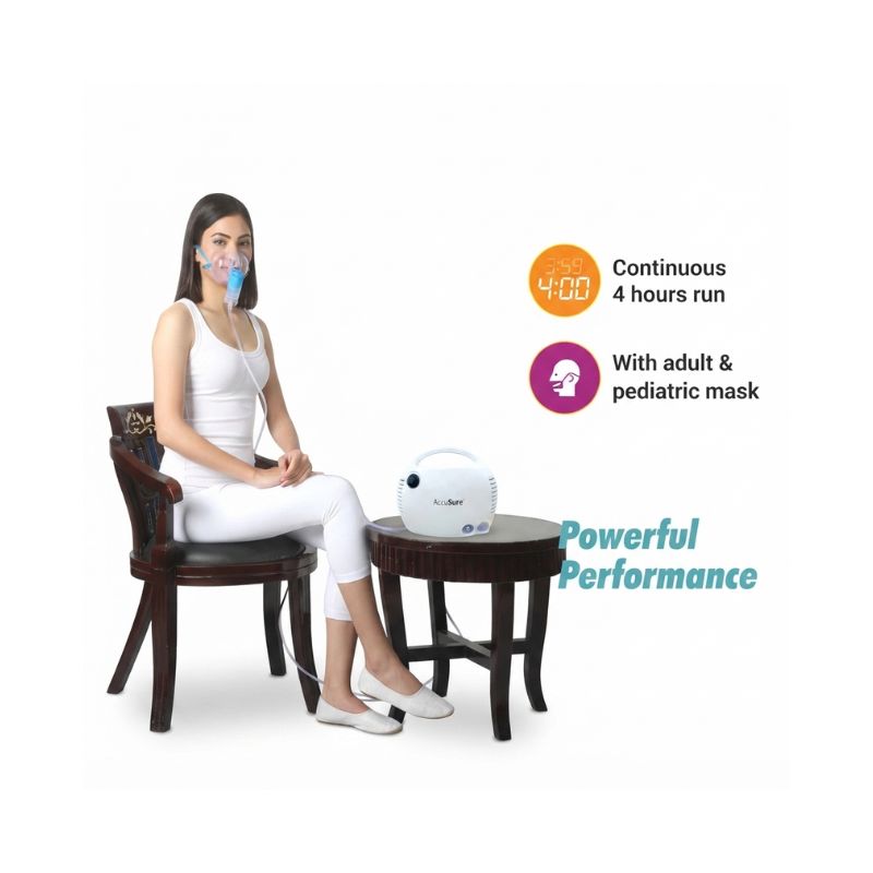 Woman using the AccuSure UL Nebulizer Portable Machine with an adult mask for respiratory treatment.