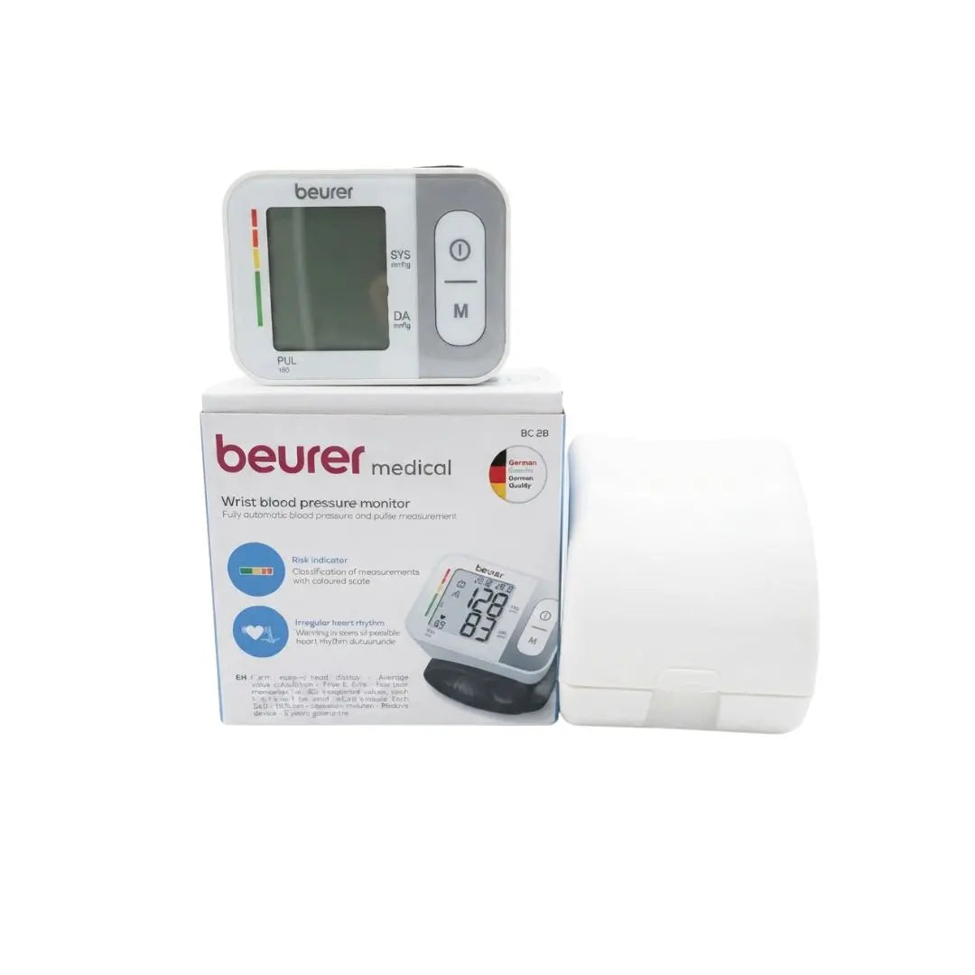 Overview showing the product box, wrist monitor unit, and protective case for the Beurer BC 28 Digital BP Machine.