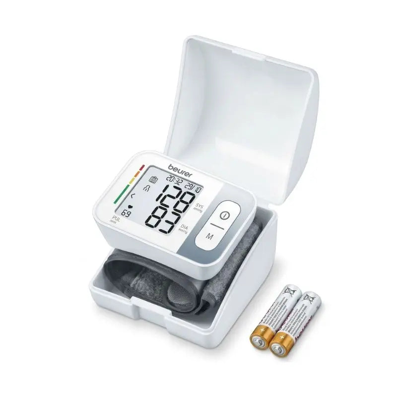 Open protective storage case displaying the monitor unit and included batteries for the Beurer BC 28 Digital BP Machine.