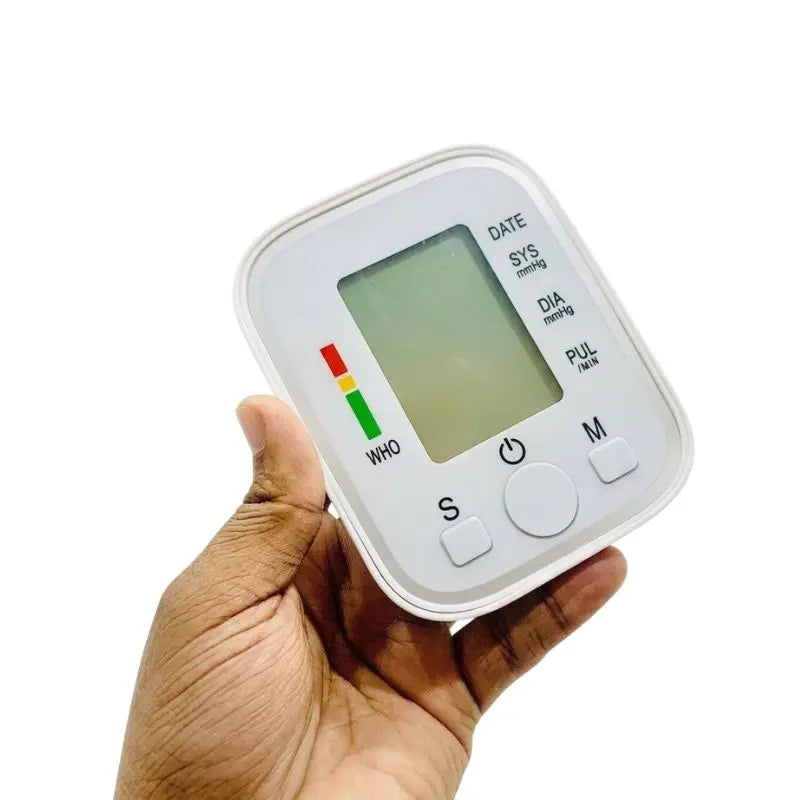 Front view of the doctor BP machine main digital monitor unit held in hand.