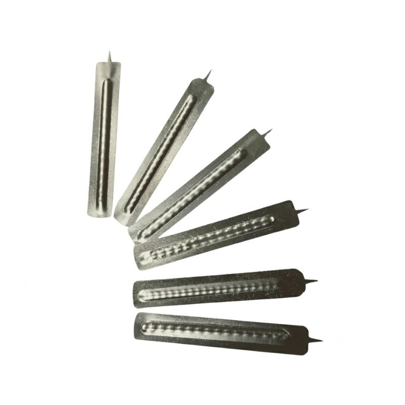 Close-up of sharp, high-precision stainless steel lancet blades for minimal tissue trauma.
