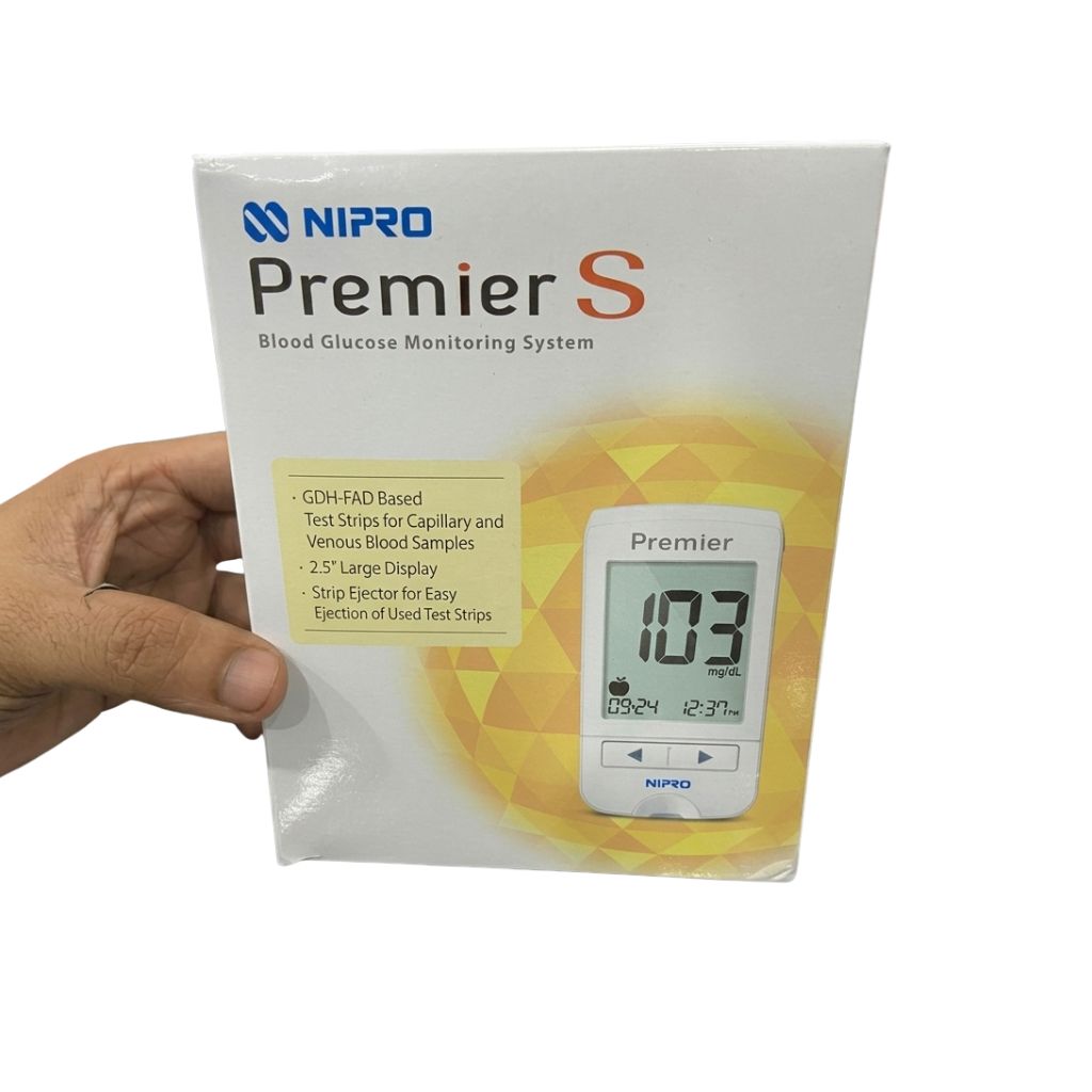 Two vials of Nipro Premier test strips and individual test strips laid out.