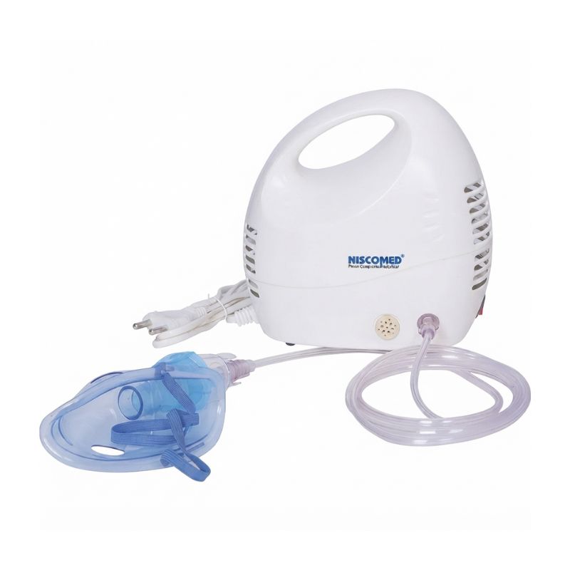 Niscomed NB-119 piston compressor nebulizer real product image – compact and portable nebulizer device with air tube and mask, designed for effective aerosol therapy at home, featuring durable piston compressor with thermal protection and noise-free operation for all ages.