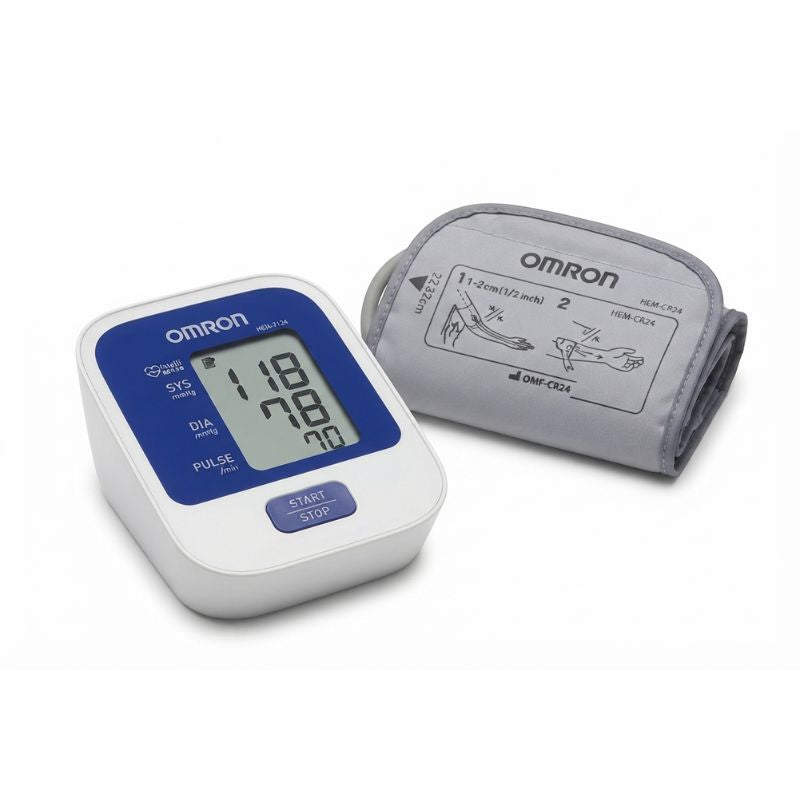 Omron HEM-7124 blood pressure monitor with HEM-CR24 cuff showing proper 1-2 cm placement above elbow and clear display of systolic/diastolic/pulse readings for accurate upper arm measurement.